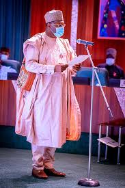 Buhari swears in INEC Boss, Yakubu, for second term