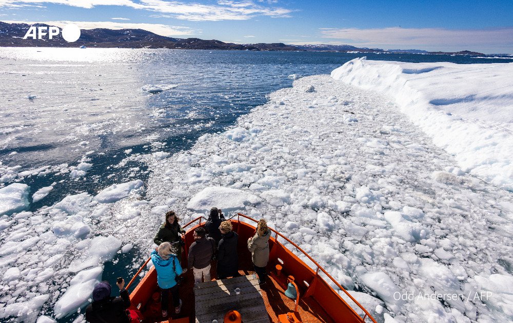 Greenland treads softly on tourism as icebergs melt