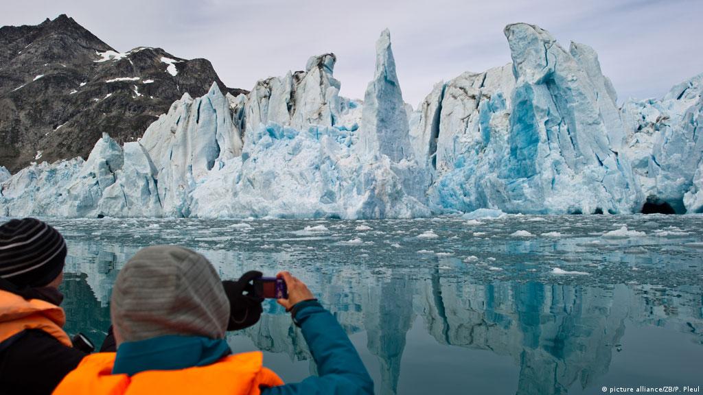 Greenland treads softly on tourism as icebergs melt