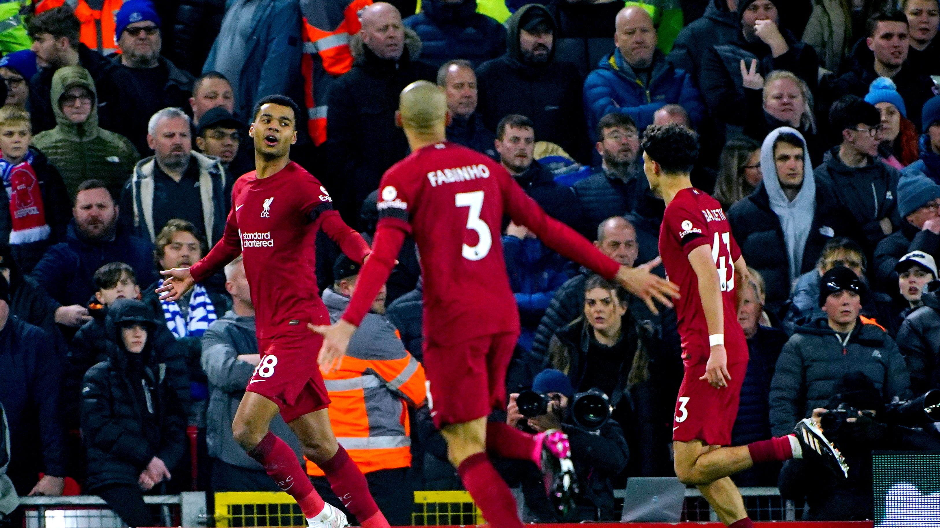 Liverpool’s Cody Gakpo (left) celebrates scoring their side’s second goal of the game during the Premier League match at Anfield, Liverpool. Picture date: Monday February 13, 2023.