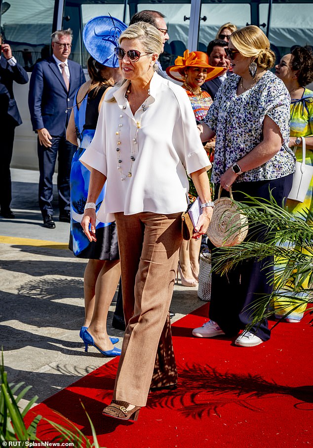 Queen Maxima of the Netherlands, 51, and her daughter Princess Catharina-Amalia, 19, looked relaxed as they prepared to board the trip taking them away from Aruba
