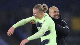 Erling Haaland (L) and Pep Guardiola (R) celebrate Man City's 1-0 win at Crystal Palace
