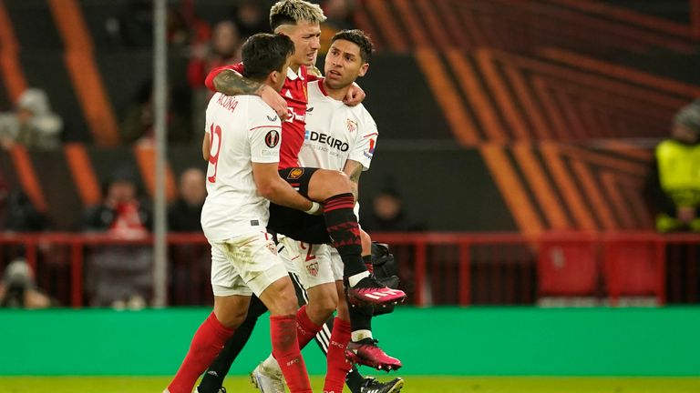 Marcos Acuna and Gonzalo Montiel help off Martinez