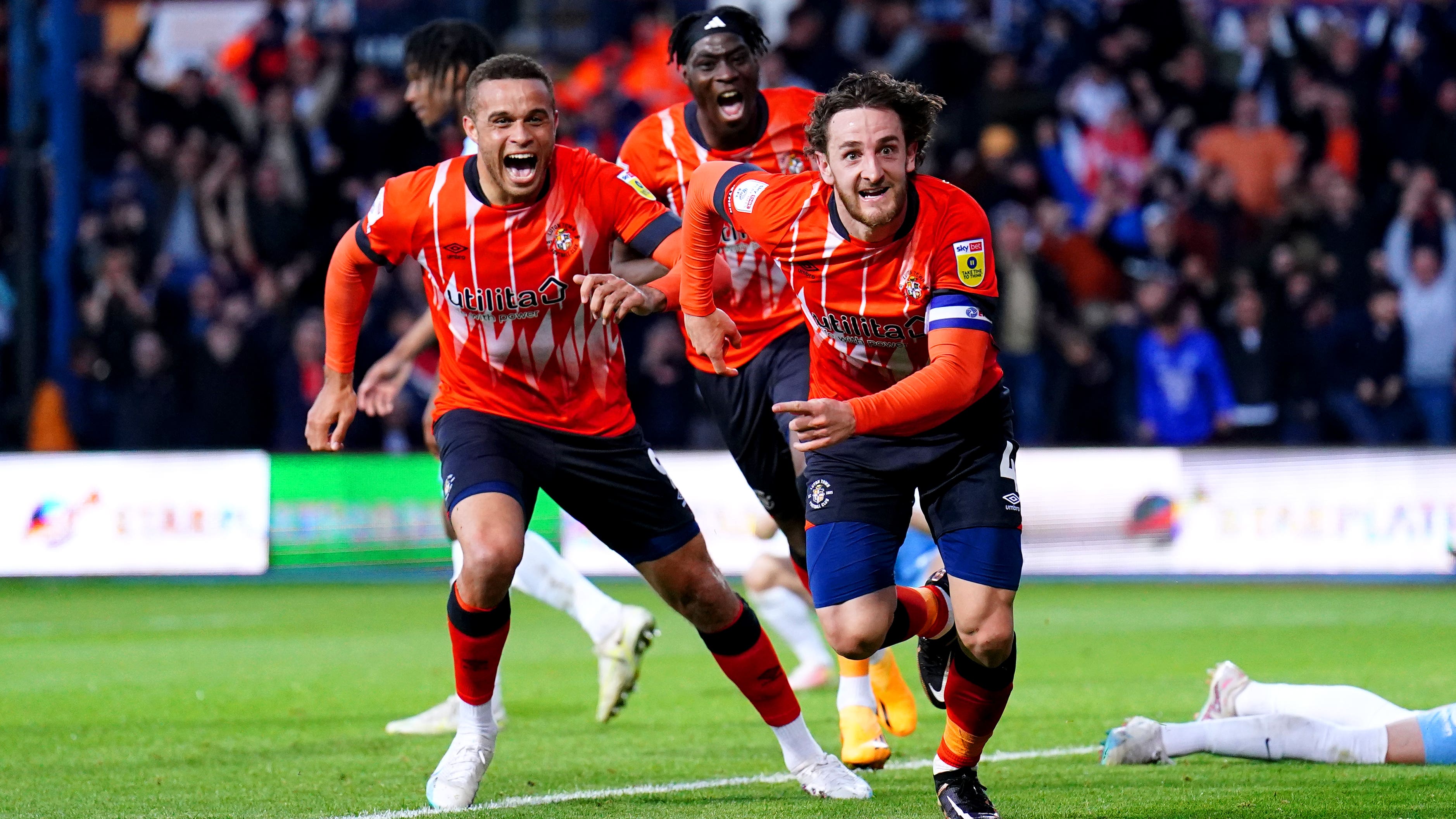 Luton’s Tom Lockyer, right, celebrates his goal (Zac Goodwin/PA)