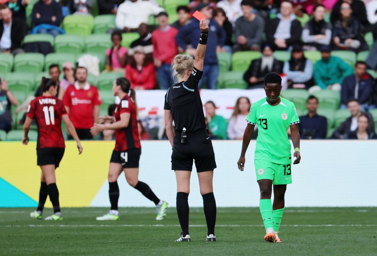 Soccer Football - FIFA Women’s World Cup Australia and New Zealand 2023 - Group B - Nigeria v Canada - Melbourne Rectangular Stadium, Melbourne, Australia - July 21, 2023 Nigeria's Deborah Abiodun is shown a red card by referee Lina Lehtovaara REUTERS/Asanka Brendon Ratnayake
