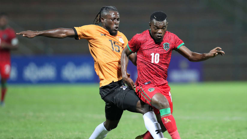 Kelvin Kapumba of Zambia challenges Chawanangwa Kaonga of Malawi during the 2023 Hollywood Bets COSAFA Cup match between Zambia and Malawi