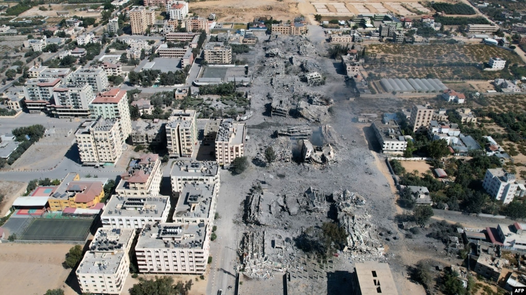An arial view shows destroyed buildings in al-Zahra city south of Gaza City following Israeli bombardment during the Israel-Hamas war, Oct. 20, 2023. Many Muslims in Nigeria have marched to show support of Palestinians and to show opposition to Israel's bombardments of Gaza.