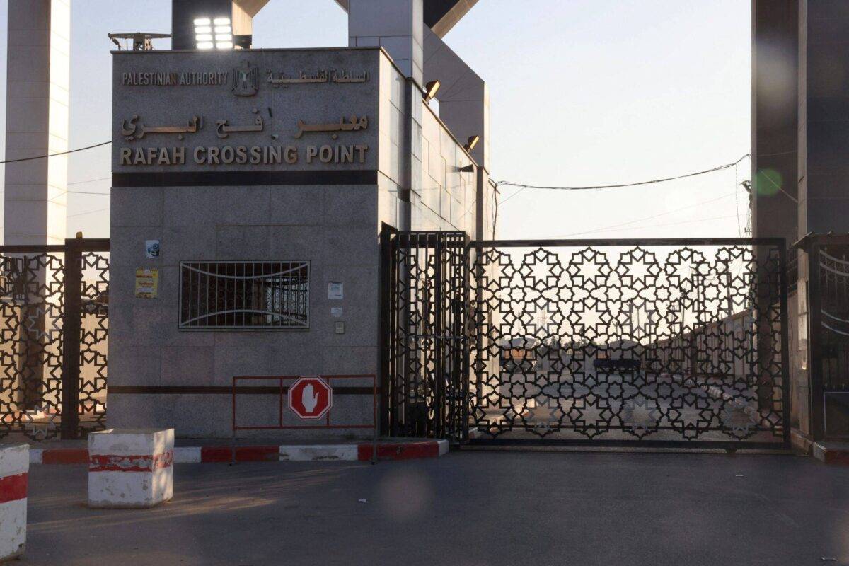 A picture taken on October 10, 2023, shows the closed gates of the Rafah border crossing with Egypt [SAID KHATIB/AFP via Getty Images]