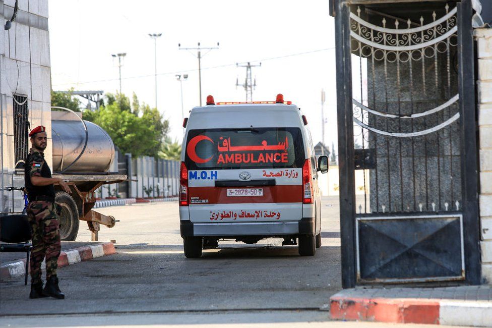 Ambulances from Egypt pass through the Rafah border crossing on 1 November