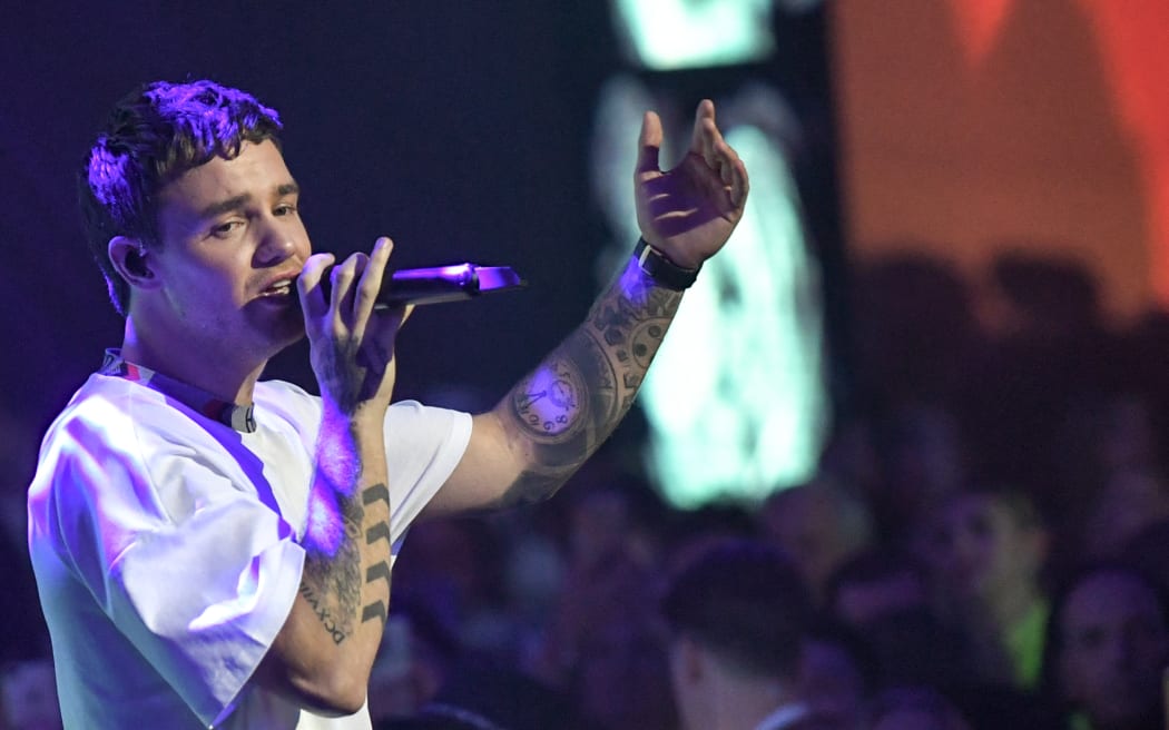 03 July 2019, Berlin: British singer Liam Payne performs at the HUGO label show in a hall in the Wriezener Karree. The collections for Spring/Summer 2020 will be presented at Berlin Fashion Week. Photo: Jens Kalaene/dpa-Zentralbild/dpa (Photo by JENS KALAENE / dpa-Zentralbild / dpa Picture-Alliance via AFP)