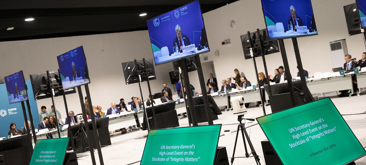 UN Secretary-General António Guterres pictured onscreen at the COP29 High-Level event: Implementation of the report “Integrity Matters” by the High-level Expert Group on the Net-Zero Emissions Commitments of Non-State Entities (HLEG).
