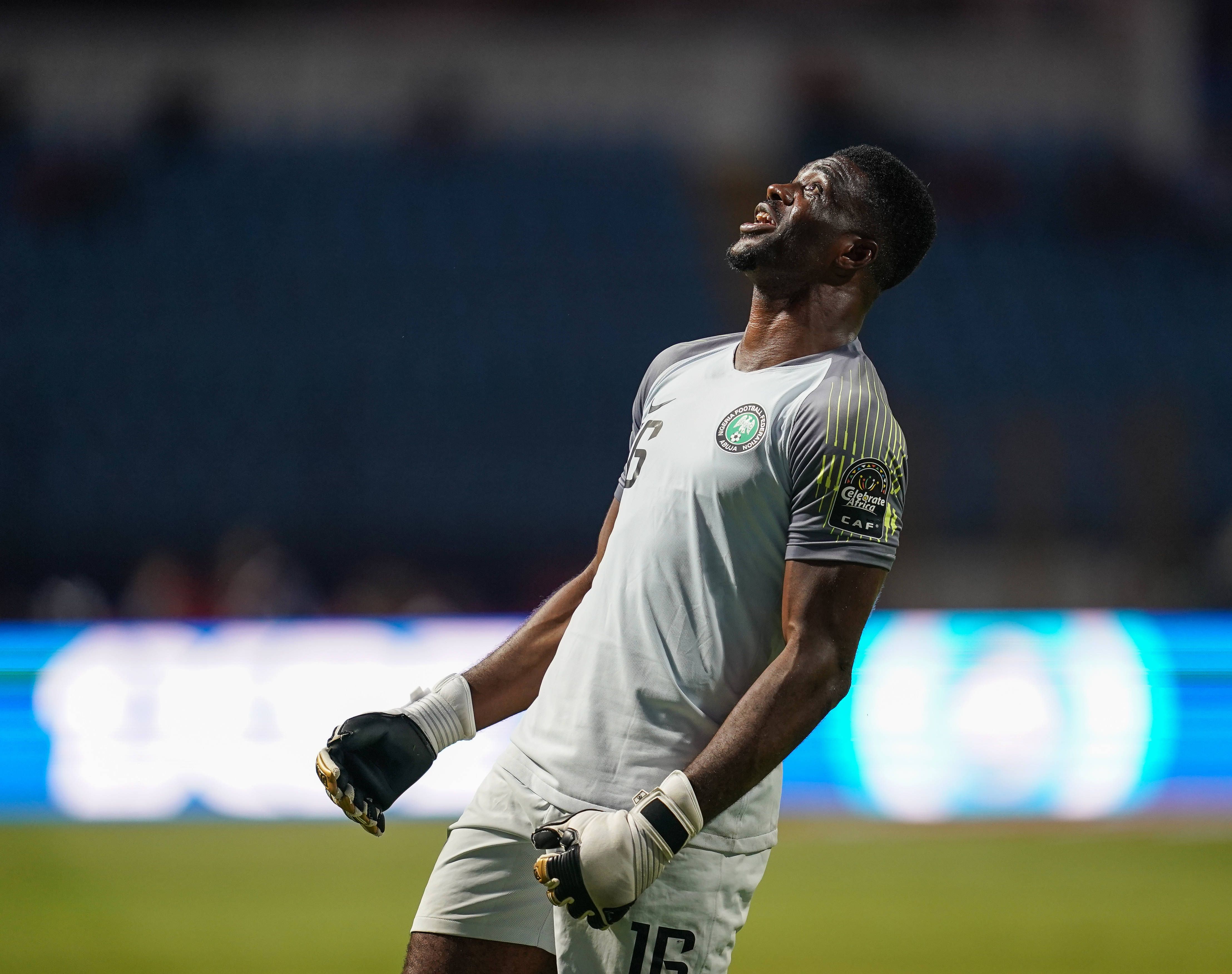 Daniel Akpeyi of Nigeria celebrating Nigeria scoring to 3-2 during the 2019 African Cup of Nations match between Cameroon and Nigeria at the Alexanddria Stadium in Alexandria, Egypt.